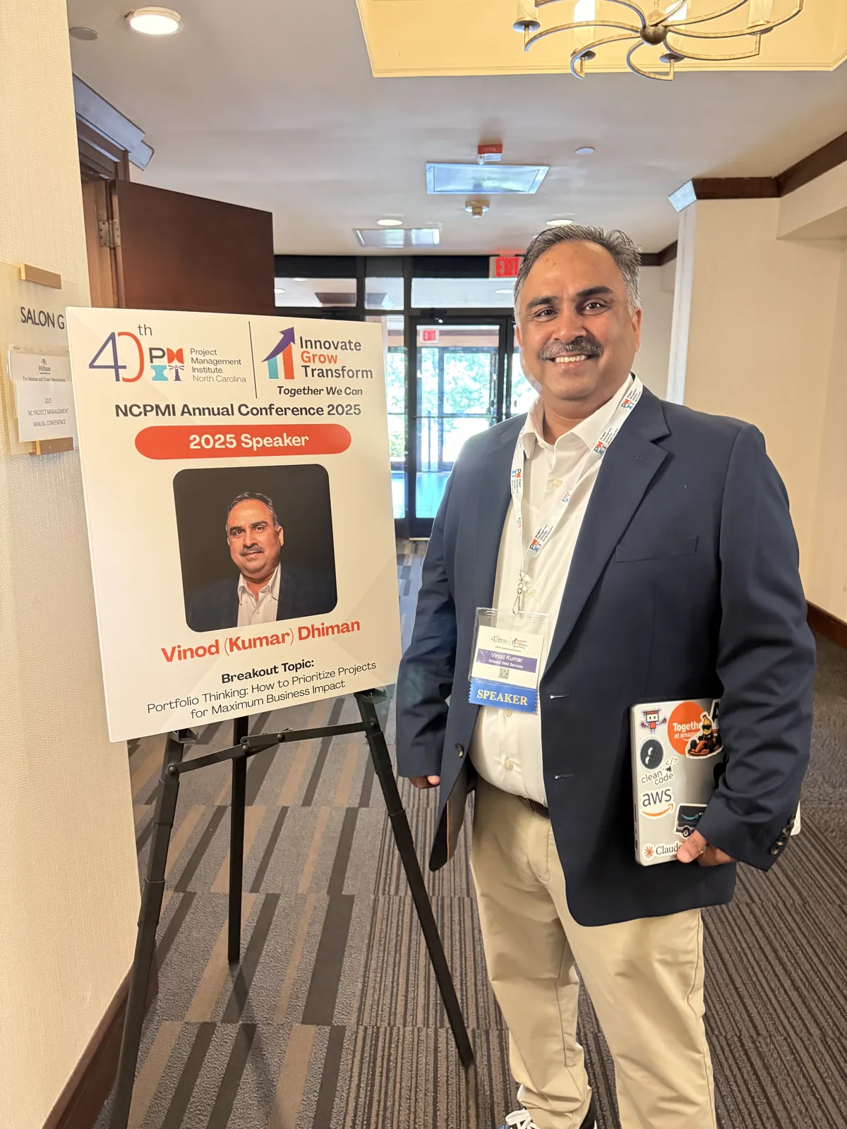 Beside the NCPMI 2025 Speaker placard